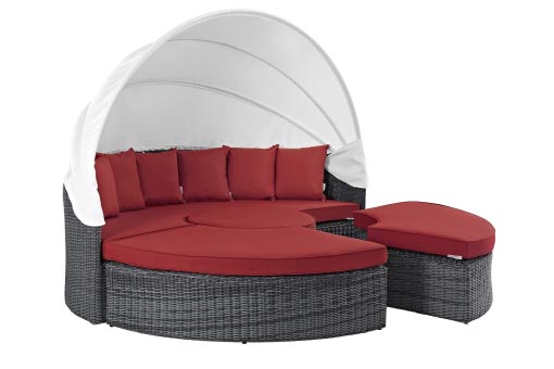 Modular daybed with red pillow-tops and white canopy attachment