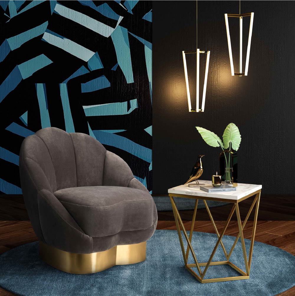 Contemporary accent chair in grey and gold table on a teal rug