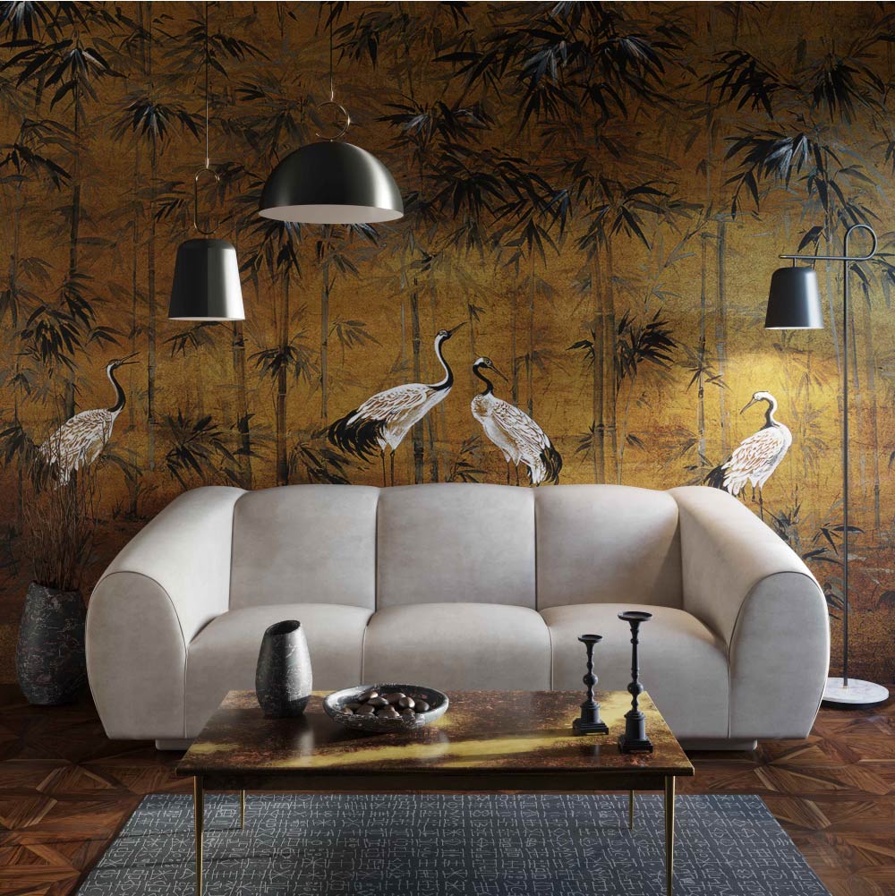 Modern sofa in beige and coffee table in front of a wall covered in cranes